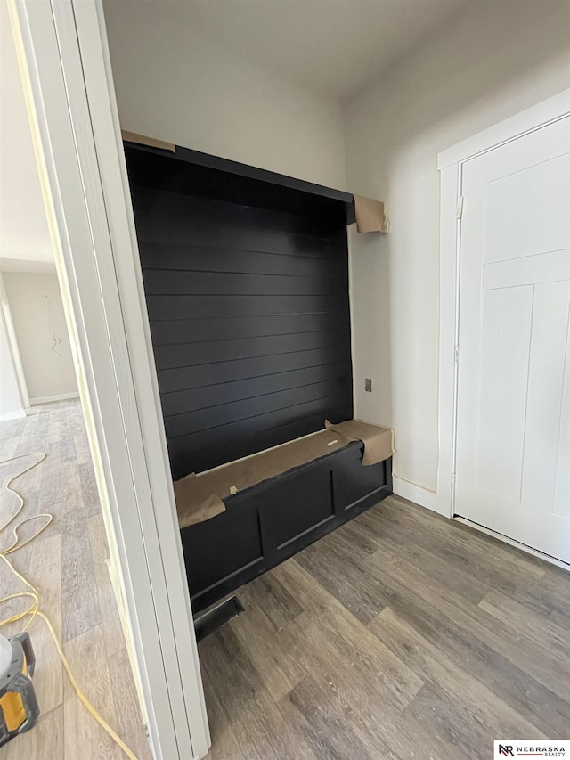 mudroom with wood finished floors