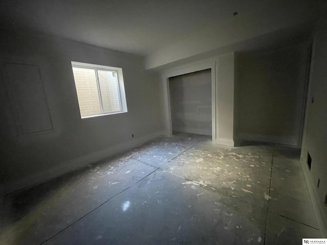 unfurnished bedroom featuring a closet