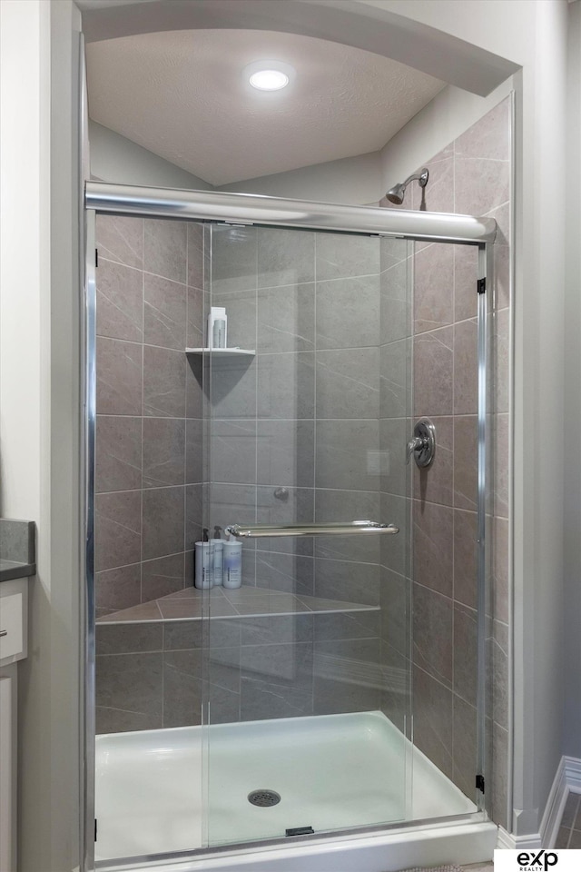 bathroom featuring walk in shower