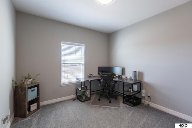 view of carpeted office space