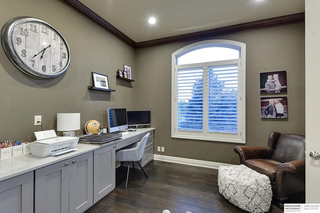 office area with ornamental molding and dark hardwood / wood-style flooring