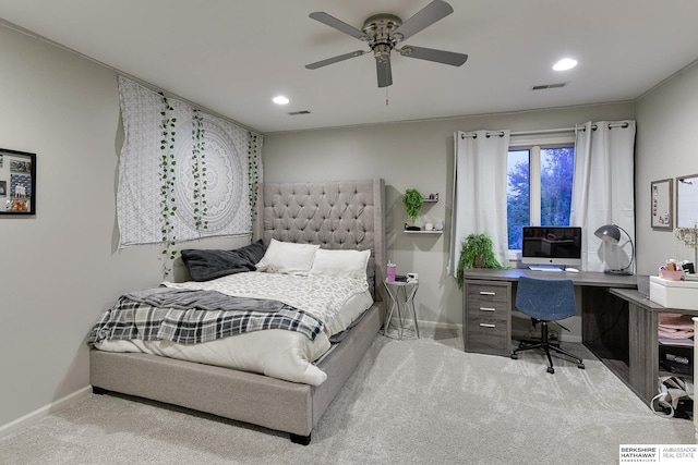 bedroom featuring ceiling fan and light colored carpet