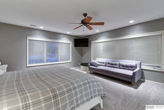 carpeted bedroom with ceiling fan