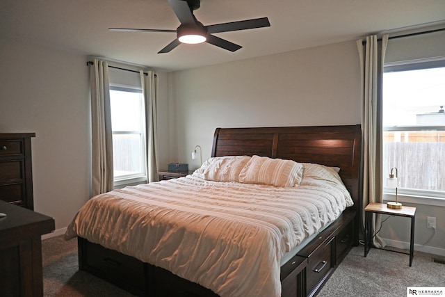 carpeted bedroom featuring ceiling fan