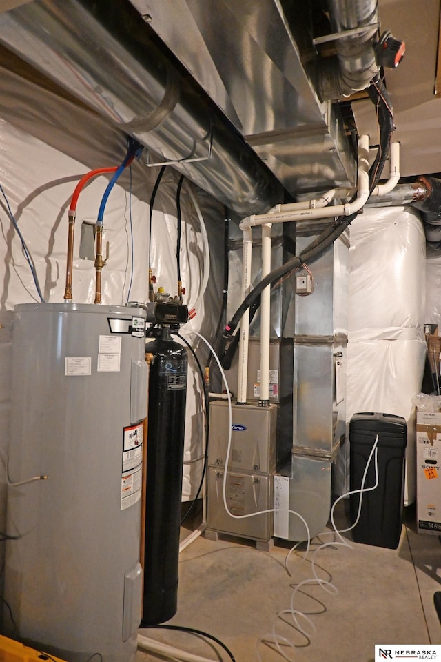 utility room with electric water heater