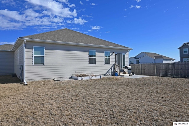 rear view of property with a patio area