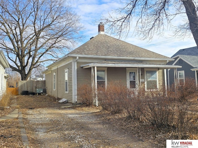 view of side of property featuring central AC unit