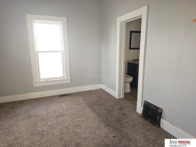 view of carpeted spare room