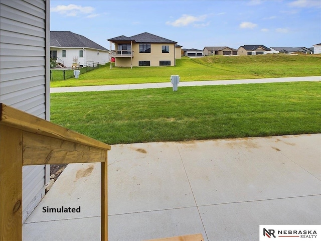 view of yard featuring a residential view