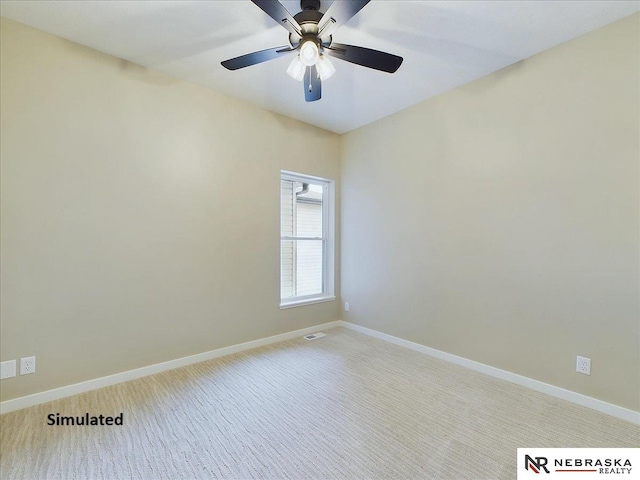 unfurnished room with baseboards, a ceiling fan, visible vents, and light colored carpet