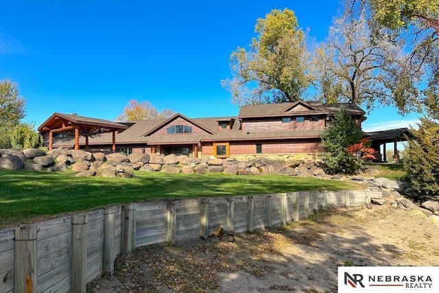 view of property exterior with a lawn