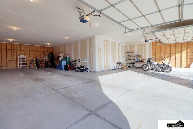 garage featuring a garage door opener