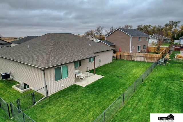 view of yard with cooling unit and a patio area