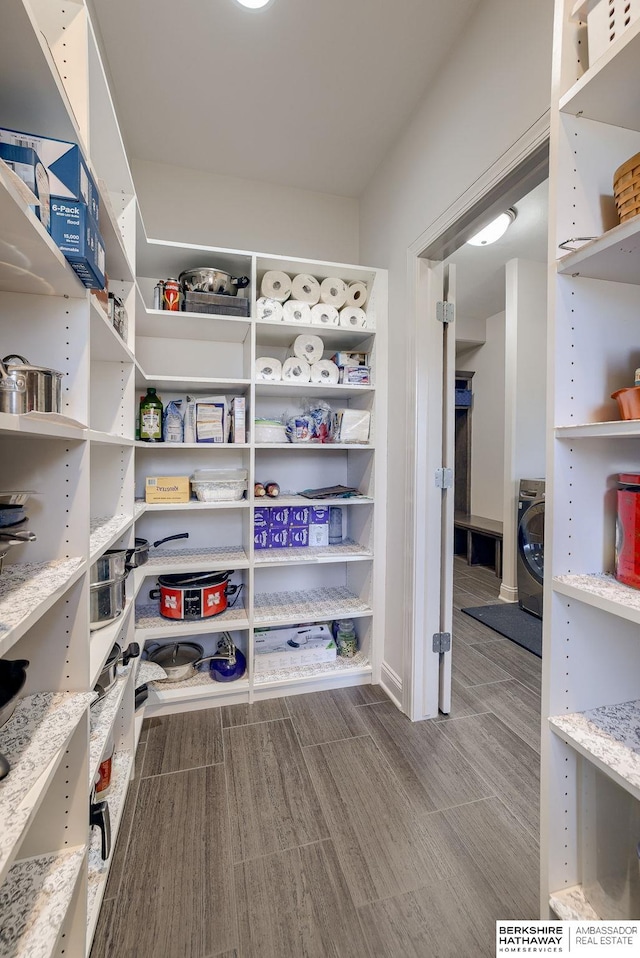 storage area featuring washer / clothes dryer