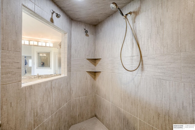 full bathroom with a tile shower