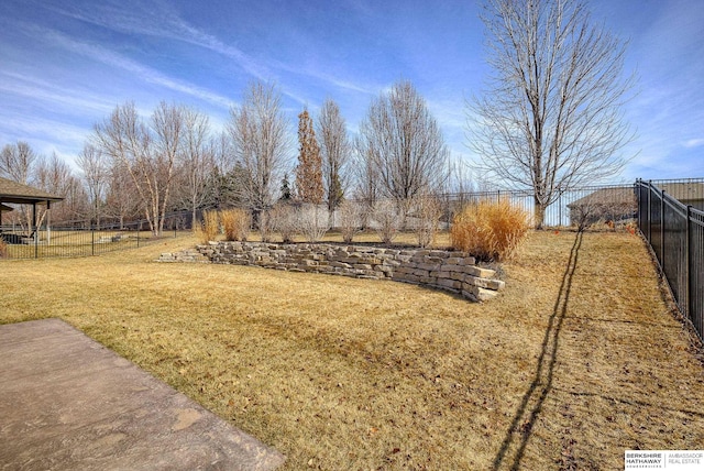 view of yard with a fenced backyard