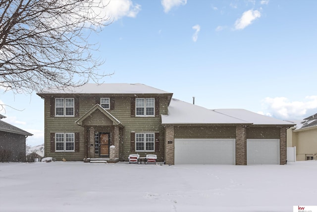 view of front of home with a garage