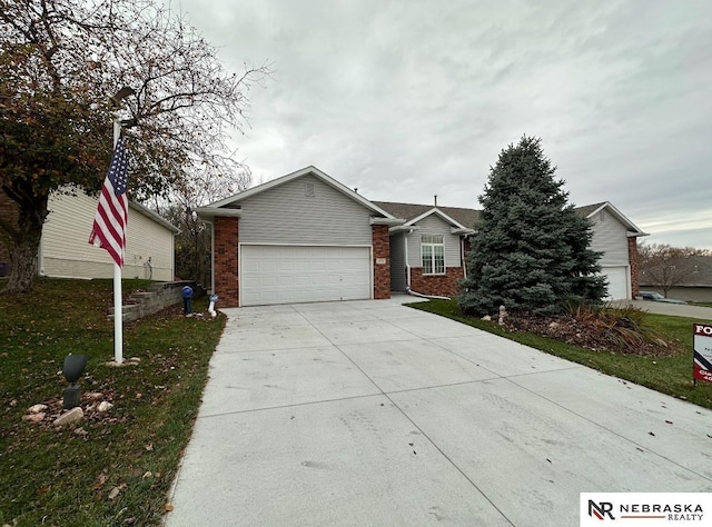 ranch-style house featuring a garage