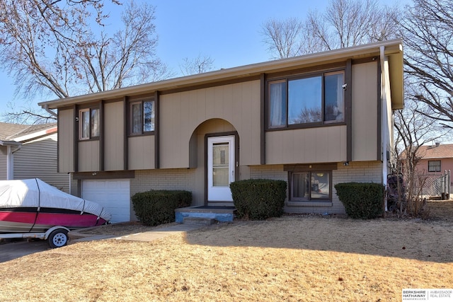 bi-level home featuring a garage