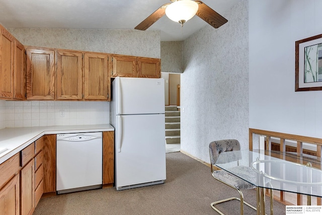 kitchen with ceiling fan, white appliances, and decorative backsplash