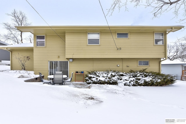 view of snow covered house