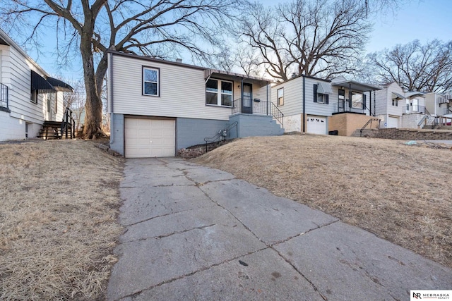 view of front of property with a garage