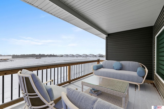 view of snow covered deck