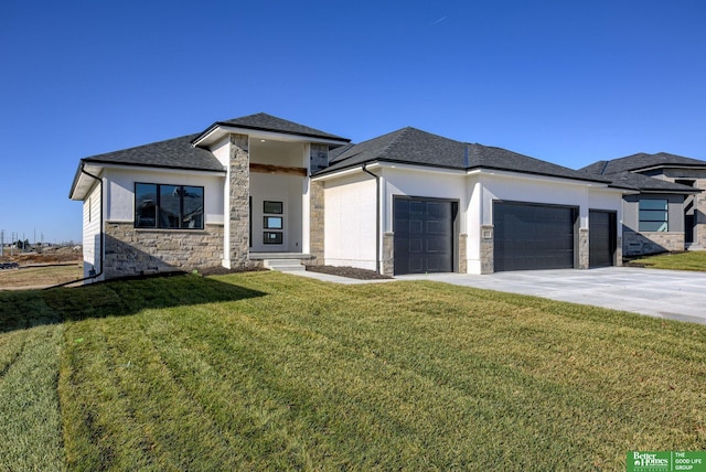 prairie-style house with a garage and a front yard