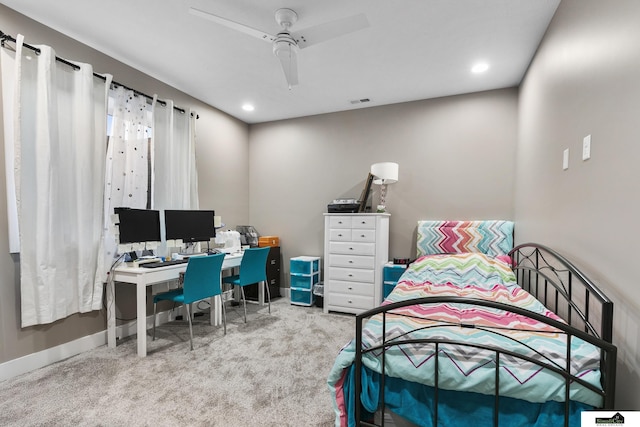 bedroom with ceiling fan and carpet flooring