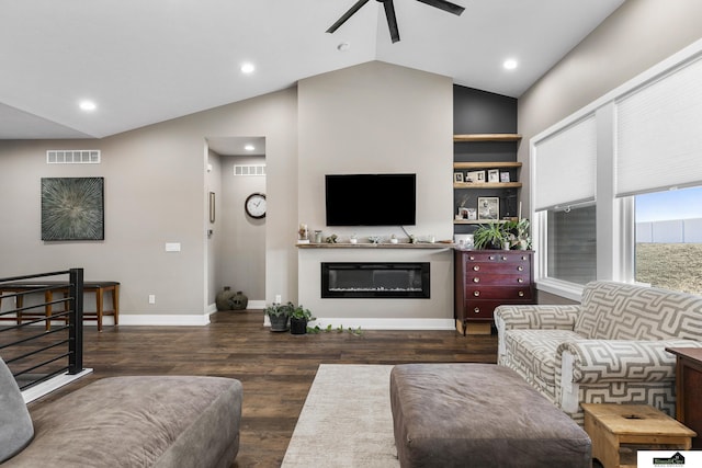 living room featuring lofted ceiling, dark hardwood / wood-style floors, and ceiling fan