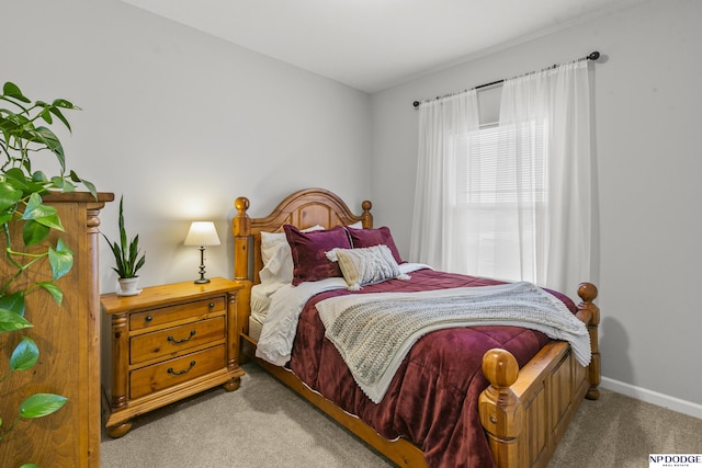 bedroom with light carpet