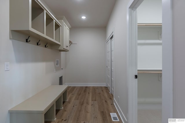 mudroom featuring light hardwood / wood-style flooring