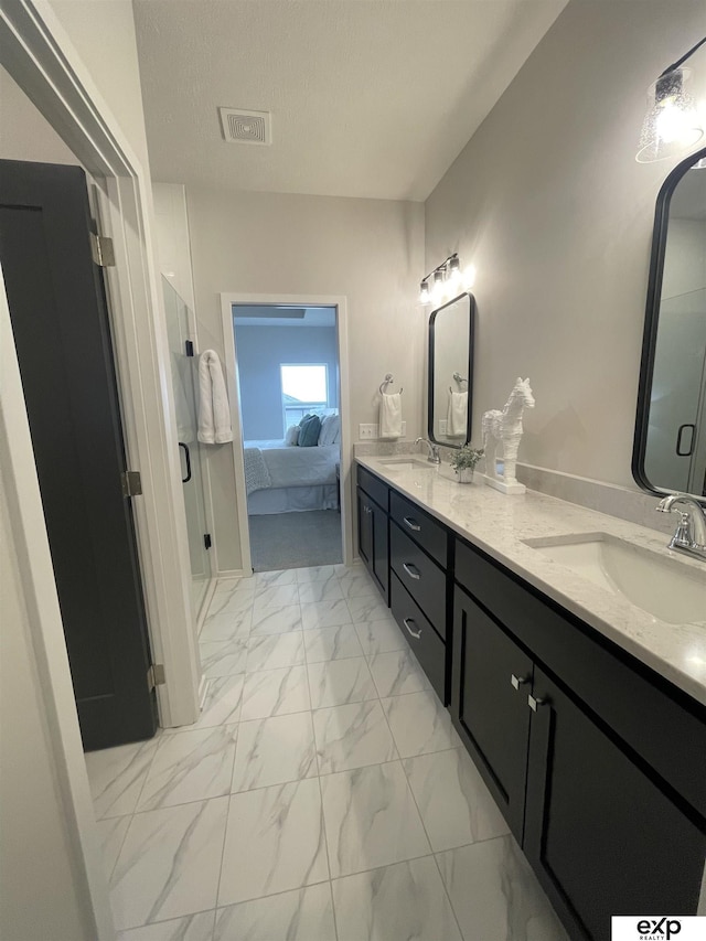 bathroom featuring vanity and a textured ceiling