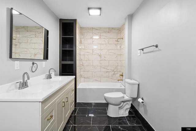 full bathroom featuring vanity, tiled shower / bath combo, and toilet