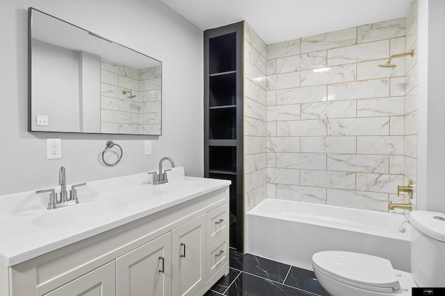 full bathroom with vanity, toilet, and tiled shower / bath