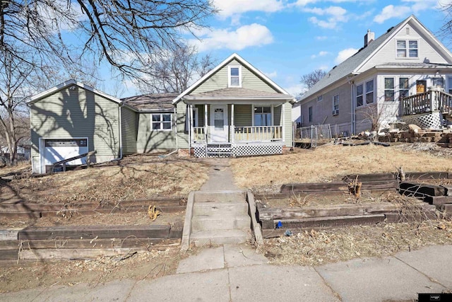 view of front facade with a porch and a garage