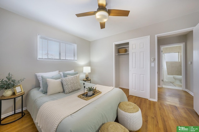 bedroom featuring light hardwood / wood-style flooring, a closet, and ceiling fan