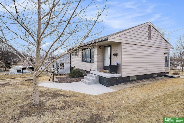 view of home's exterior featuring a yard