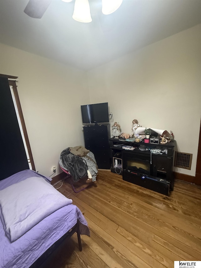 bedroom featuring hardwood / wood-style floors