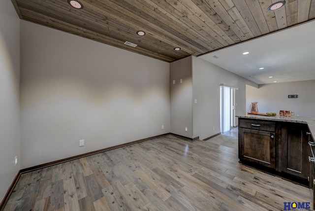 interior space with recessed lighting, wooden ceiling, baseboards, and light wood finished floors