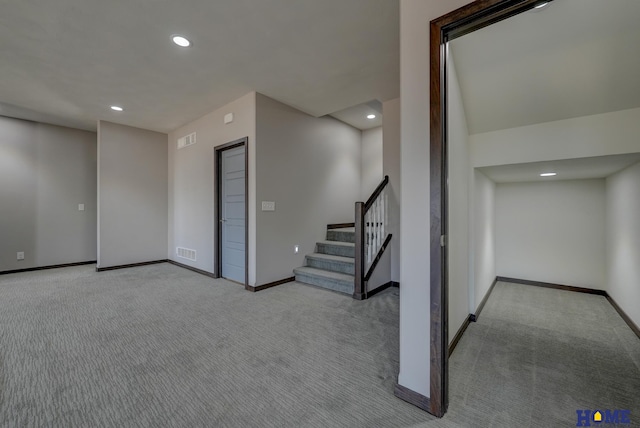 basement featuring stairway, recessed lighting, carpet flooring, and baseboards