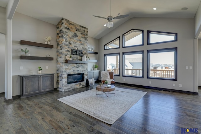 living room with dark wood finished floors, a fireplace, visible vents, high vaulted ceiling, and baseboards