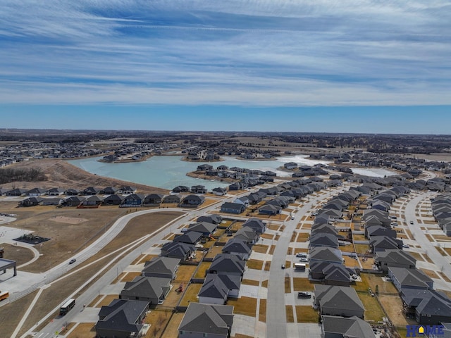 aerial view featuring a water view and a residential view