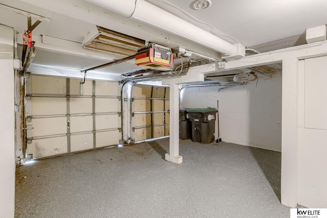 garage featuring a garage door opener