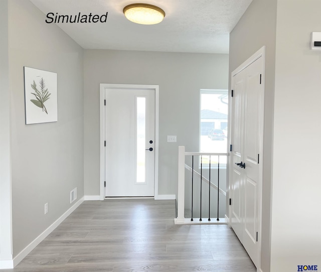 foyer featuring light hardwood / wood-style flooring