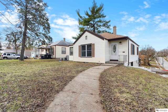 view of front of home with a front yard