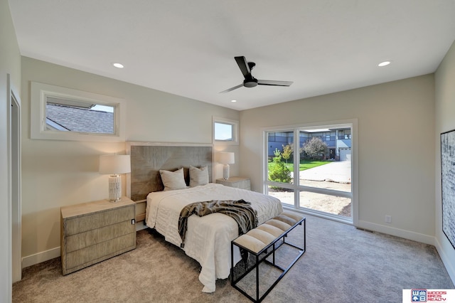 carpeted bedroom featuring ceiling fan