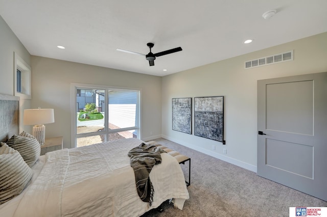 bedroom with light carpet and ceiling fan