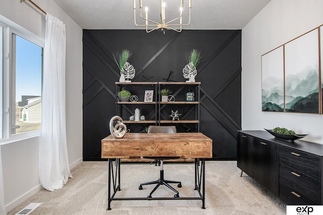 office space with light carpet and a notable chandelier