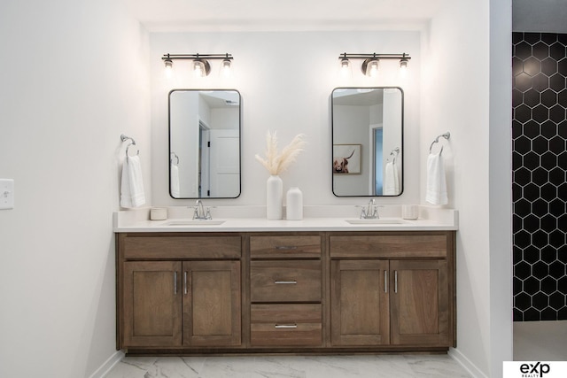 bathroom with vanity and a shower